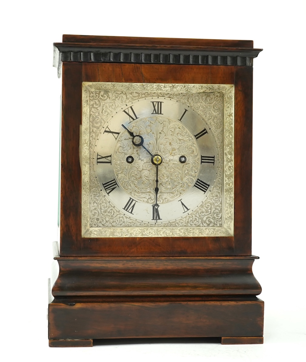 A William IV four glass rosewood double fusee library clock by James Muirhead